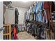 Walk-in closet featuring rods and shelving for optimal storage at 585 Ashland Pkwy, Woodstock, GA 30189
