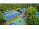 Aerial view of community amenities, including tennis and basketball courts at 650 Garden Wilde Pl, Roswell, GA 30075