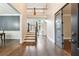 Grand foyer featuring hardwood floors, staircase, and elegant doorway with decorative glass at 650 Garden Wilde Pl, Roswell, GA 30075