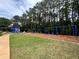 Community playground with swings, slides, and play structures for children at 650 Garden Wilde Pl, Roswell, GA 30075
