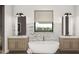 Luxurious bathroom with a soaking tub, double vanity, and marble accents at 13375 Fincher Rd, Canton, GA 30114