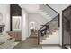Spacious entryway with a modern staircase and stylish décor at 13375 Fincher Rd, Canton, GA 30114