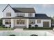 Rear exterior view of a white modern farmhouse with a dark roof, swimming pool, and covered patio at 13375 Fincher Rd, Canton, GA 30114