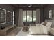 Comfortable main bedroom with a large window, neutral decor, and views of the backyard at 13375 Fincher Rd, Canton, GA 30114