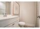 Modern bathroom with a white vanity and a sleek faucet and a toilet at 2038 Brookhill Way Lot 6, Snellville, GA 30078