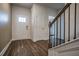 Entryway features wood flooring, front door and access to other rooms in the home at 2038 Brookhill Way Lot 6, Snellville, GA 30078