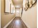 Long hallway with a decorative wall and wood-look flooring, leading to the front door at 2038 Brookhill Way Lot 6, Snellville, GA 30078