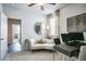 Bright home office with hardwood floors, a cozy sofa, and a large window at 2038 Brookhill Way Lot 6, Snellville, GA 30078