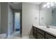 Neutral bathroom with a single sink vanity, neutral walls, and neutral flooring at 962 Taylors Farm Ct, Canton, GA 30115