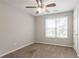 Simple bedroom with carpet flooring and natural light at 962 Taylors Farm Ct, Canton, GA 30115
