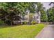 Charming two-story home with front yard landscaping, stone accents at 962 Taylors Farm Ct, Canton, GA 30115