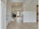 Bright entryway with beautiful flooring, staircase, and natural light streaming in at 316 Moab Ct, Stockbridge, GA 30281