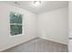A bedroom with a large window brings in a lot of natural light at 4001 Avalon Sw Rd, Atlanta, GA 30331