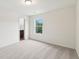 Bedroom with a neutral carpet and view of a bathroom and closet at 4001 Avalon Sw Rd, Atlanta, GA 30331