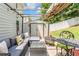 Covered patio featuring outdoor seating and backyard views at 6317 Selborn Sw Dr, Atlanta, GA 30331