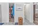 Hallway with a view of a walk-in closet and powder room at 6317 Selborn Sw Dr, Atlanta, GA 30331