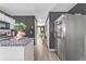 Bright kitchen featuring stainless steel refrigerator and granite countertops at 6317 Selborn Sw Dr, Atlanta, GA 30331