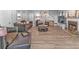 Spacious living room with a fireplace, modern flooring, and comfortable couches at 6317 Selborn Sw Dr, Atlanta, GA 30331