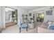 Inviting living room with neutral decor, plush seating, and a glimpse into the adjacent dining and foyer areas at 6317 Selborn Sw Dr, Atlanta, GA 30331