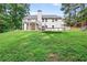 A spacious backyard featuring a trampoline and playset, perfect for outdoor fun and Gathering activities at 2565 Aaron Ct, Loganville, GA 30052