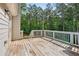 View of the deck and wooded backyard at 2565 Aaron Ct, Loganville, GA 30052