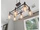 Modern light fixture in the dining room area at 2565 Aaron Ct, Loganville, GA 30052