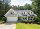 Charming single-Gathering home with a welcoming front porch and well-manicured lawn at 2565 Aaron Ct, Loganville, GA 30052
