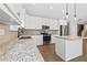 Spacious kitchen featuring an island, granite countertops, and stainless steel appliances at 2565 Aaron Ct, Loganville, GA 30052