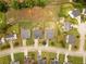 Aerial view of a residential area showing the layout of homes, streets, and green spaces at 2645 Barkley Manor Dr, Lawrenceville, GA 30044