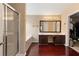 Primary bathroom with double sinks, vanity space, a walk-in closet, and a glass shower at 2645 Barkley Manor Dr, Lawrenceville, GA 30044