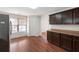 Spacious kitchen with stainless steel refrigerator and wood-toned cabinets at 2645 Barkley Manor Dr, Lawrenceville, GA 30044