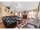 Spacious living room with a fireplace, plush sofas, and ample seating for entertaining guests at 2645 Barkley Manor Dr, Lawrenceville, GA 30044