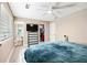 Bright bedroom with a view of the walk-in closet, wood flooring and neutral paint to showcase the space at 3385 Huntington Ct, Douglasville, GA 30134