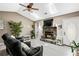 Bright living room with a stone fireplace, vaulted ceilings, skylights and comfortable seating at 3385 Huntington Ct, Douglasville, GA 30134