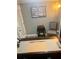 Office area featuring a clean desk, a comfortable chair, and an interesting decorative painting at 1044 Mariners Ct, Stone Mountain, GA 30083