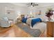 Stylish bedroom with hardwood floors, large windows, ceiling fan and chic decor at 2259 Eastway Rd, Decatur, GA 30033