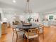 Open concept dining area with stylish furnishings and views into the kitchen at 2259 Eastway Rd, Decatur, GA 30033