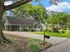 Charming single Gathering home with a well-manicured front lawn, mature trees, and a welcoming entrance at 2259 Eastway Rd, Decatur, GA 30033