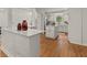 Well-lit kitchen with an island, white cabinetry, and open layout at 2259 Eastway Rd, Decatur, GA 30033