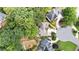 Aerial view of the property with mature trees, manicured lawns, and a serene outdoor living space at 3450 Merganser Ln, Alpharetta, GA 30022