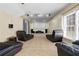 Finished basement features reclining leather chairs and a projector screen at 3450 Merganser Ln, Alpharetta, GA 30022