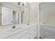 Bathroom featuring a double vanity with a large mirror and modern lighting at 3450 Merganser Ln, Alpharetta, GA 30022