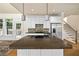 Spacious kitchen with a large island, stainless steel appliances, and white cabinetry at 3450 Merganser Ln, Alpharetta, GA 30022
