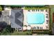 Overhead view of a luxurious community swimming pool, complete with lounge chairs, umbrellas, and well-maintained landscaping at 3450 Merganser Ln, Alpharetta, GA 30022