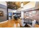 Open-concept kitchen and dining area with modern appliances and brick accents at 1026 Saint Charles Ne Ave # 15, Atlanta, GA 30306