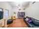 Comfortable living room with hardwood floors, a sofa, and natural light at 1026 Saint Charles Ne Ave # 15, Atlanta, GA 30306