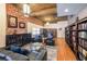 Spacious living room with exposed brick wall and stylish furnishings at 1026 Saint Charles Ne Ave # 15, Atlanta, GA 30306