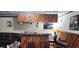Finished basement features a vintage wet bar with barstool seating and wood paneling at 200 Fox Hall Court Ct, South Fulton, GA 30349