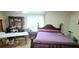 Bedroom featuring a bed, an armoire, and a window with blinds at 200 Fox Hall Court Ct, South Fulton, GA 30349