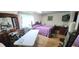 Bedroom features a bed, a wardrobe, and a window with blinds at 200 Fox Hall Court Ct, South Fulton, GA 30349